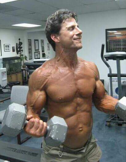 Paul O'Lone training with dumbbells