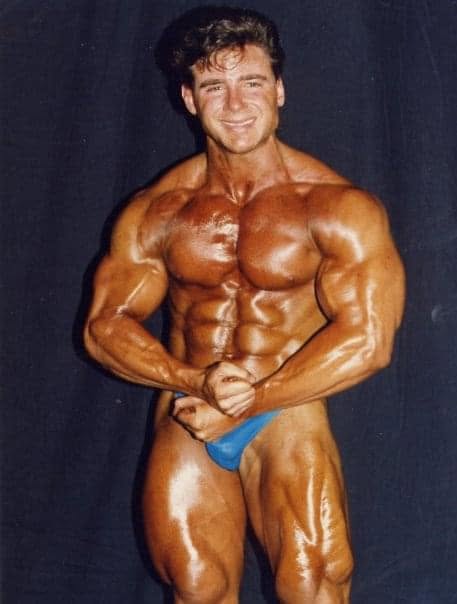 Paul O'Lone in a bodybuilding pose