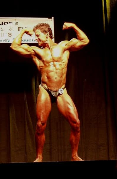 Paul O'Lone competing on a bodybuilding stage